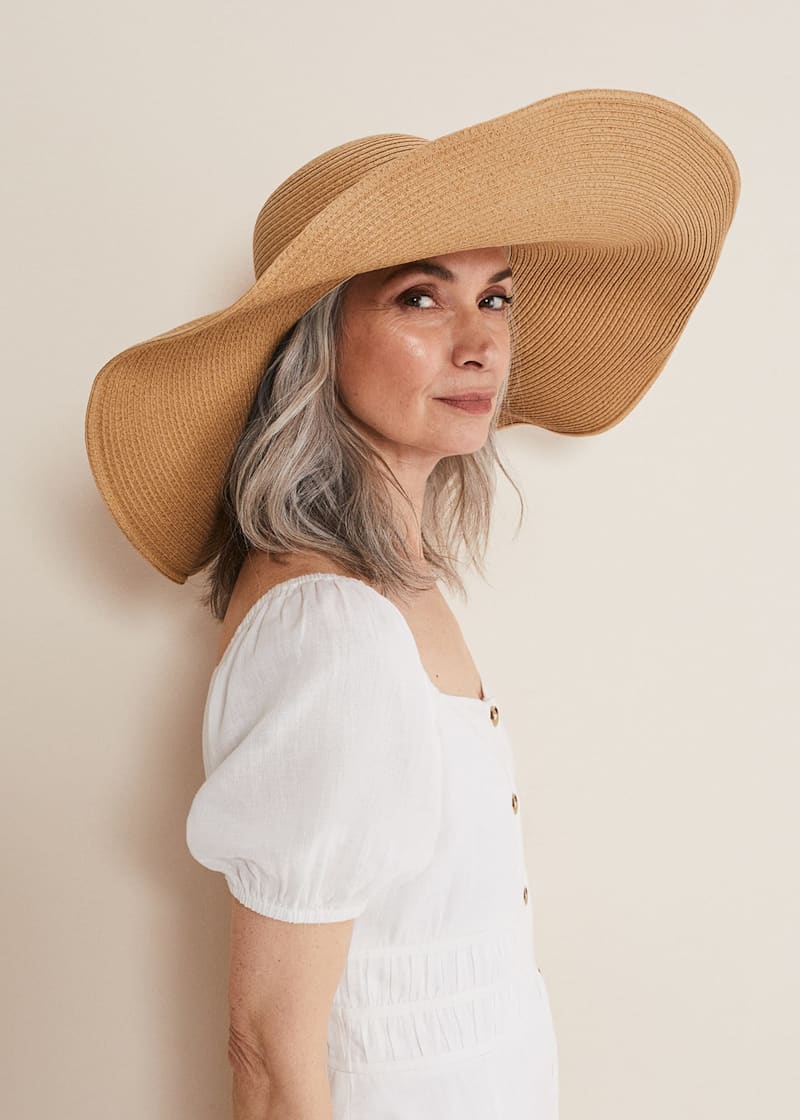 Oversized straw cowboy hat store