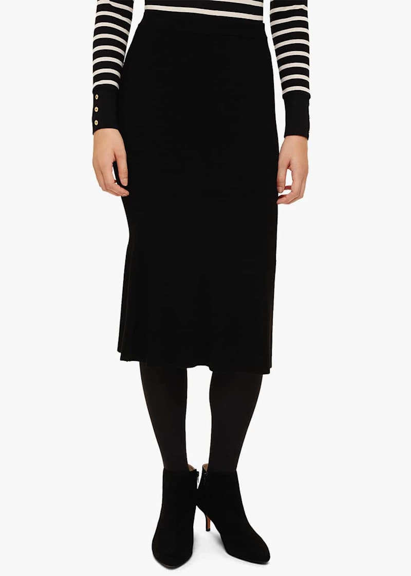 Black peplum hem skirt top