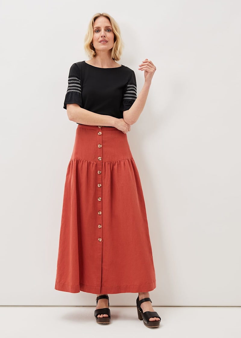 Rust button deals down skirt